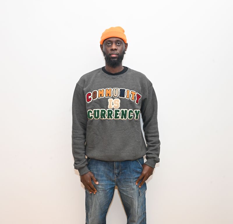 Community is Currency Crewneck in Gray